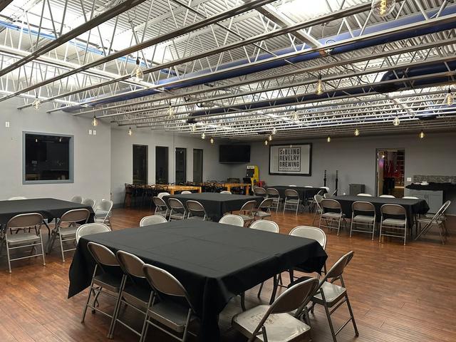 The Kennedy Room private event space set with tables